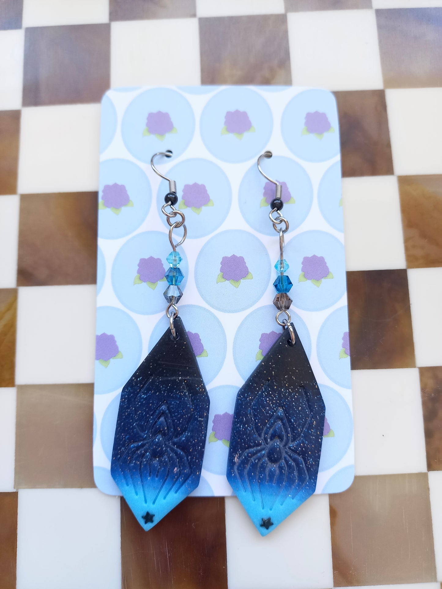 Glittery Blue Spiderweb Earrings
