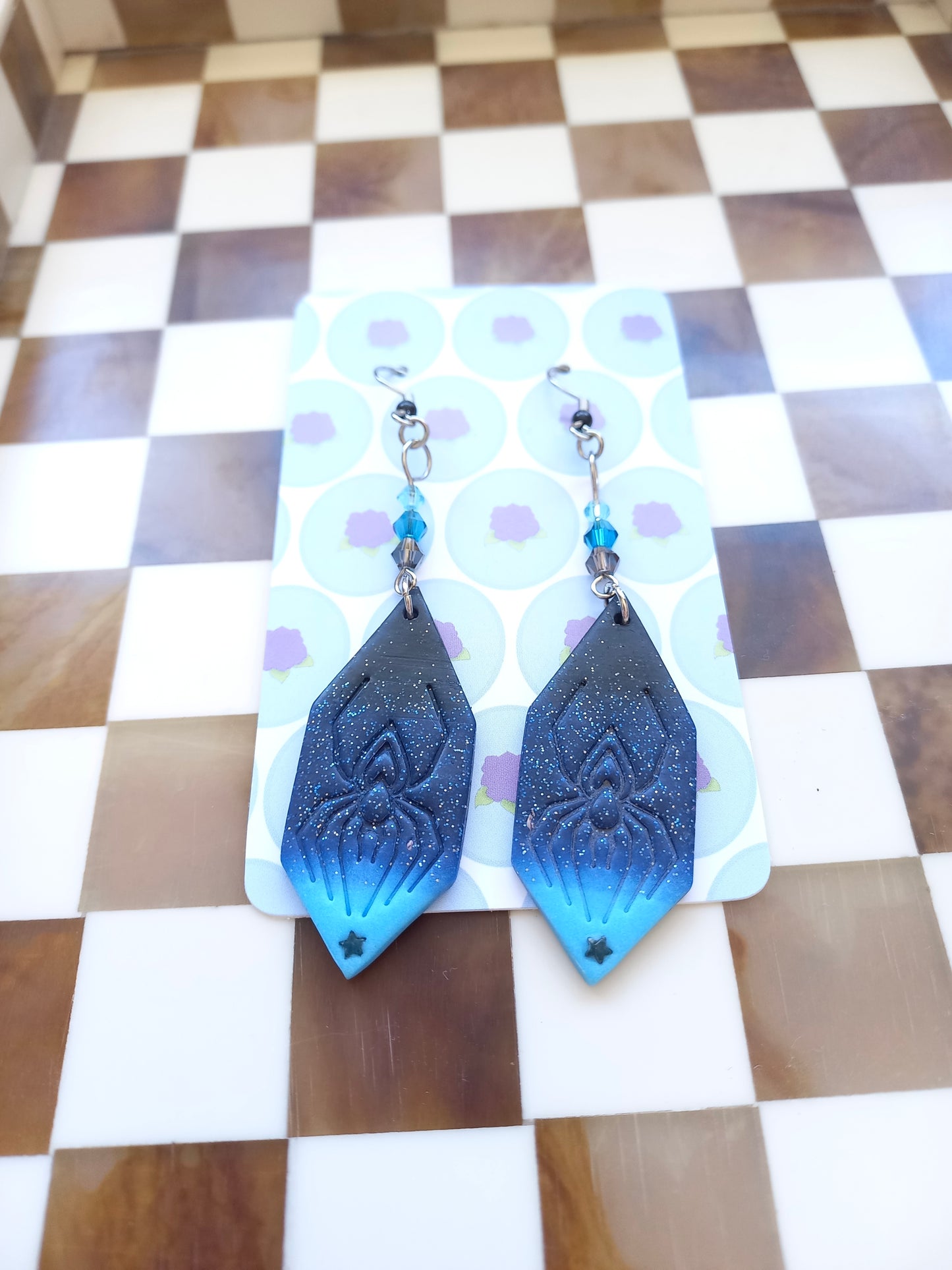 Glittery Blue Spiderweb Earrings