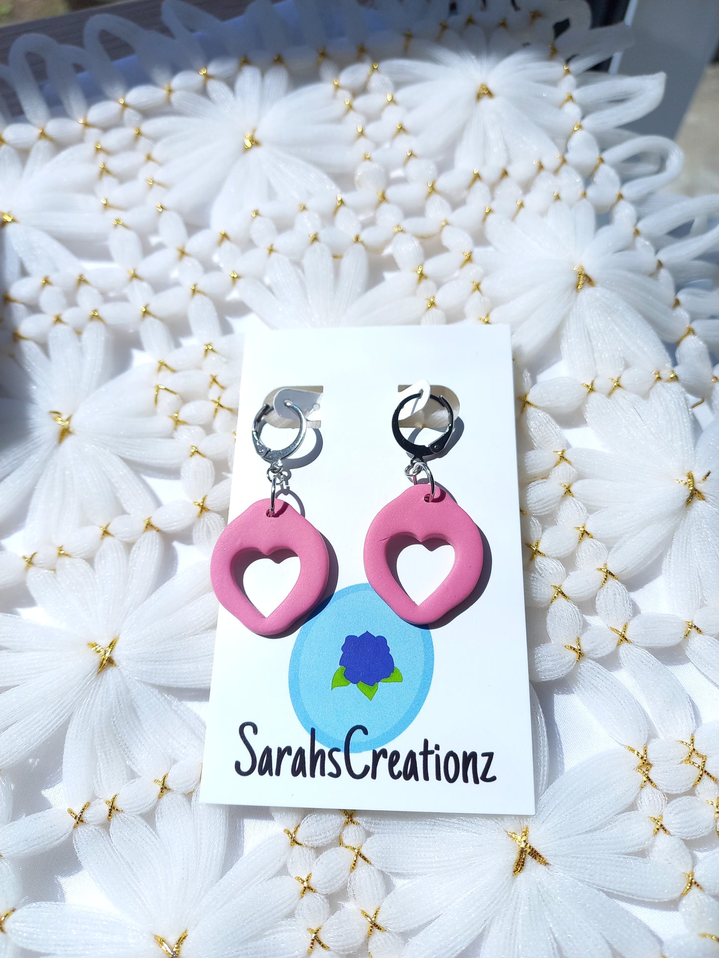 Pink heart cut out huggie earrings | Love Collection